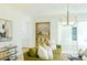 A cozy living room featuring a comfortable green couch and stylish decor at 1662 Rainier Falls Ne Dr, Atlanta, GA 30329