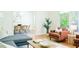 Open-concept living room with hardwood floors and stylish decor at 1662 Rainier Falls Ne Dr, Atlanta, GA 30329
