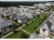 Gorgeous aerial shot of the community showcasing lush lawns, beautiful landscaping, and elegant home exteriors at 316 S Esplanade, Alpharetta, GA 30009