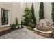 Secluded backyard featuring a stone water feature, garden and attractive landscaping at 316 S Esplanade, Alpharetta, GA 30009