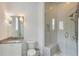 Bright bathroom featuring a glass shower, modern fixtures, and ample counter space at 316 S Esplanade, Alpharetta, GA 30009