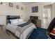 Comfortable bedroom with a bed, desk, and decor at 316 S Esplanade, Alpharetta, GA 30009