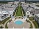 Aerial view of the community pool with ample seating and manicured grounds, perfect for relaxation and entertainment at 316 S Esplanade, Alpharetta, GA 30009