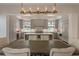 Light and bright dining room, with a view into the kitchen featuring stainless steel appliances at 316 S Esplanade, Alpharetta, GA 30009