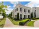 Beautiful two-story home with a well-manicured lawn and classic white brick facade at 316 S Esplanade, Alpharetta, GA 30009