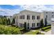 Beautiful two-story home with a well-manicured lawn and classic white brick facade at 316 S Esplanade, Alpharetta, GA 30009