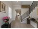 Bright foyer with hardwood floors and view of staircase at 316 S Esplanade, Alpharetta, GA 30009