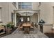 Outdoor patio with a dining table under an umbrella, and a built-in grill at 316 S Esplanade, Alpharetta, GA 30009