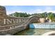 Community entrance at Sugarloaf featuring a water feature and signage at 319 Elgin Dr # 156, Lawrenceville, GA 30045