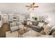 Cozy living room open to kitchen features plush seating, neutral tones, and an open floor plan at 319 Elgin Dr # 156, Lawrenceville, GA 30045