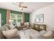 Inviting living room with plush seating, abundant natural light, and stylish decor at 319 Elgin Dr # 156, Lawrenceville, GA 30045