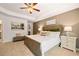 Relaxing main bedroom features a tray ceiling, plush carpet, and calming decor at 319 Elgin Dr # 156, Lawrenceville, GA 30045