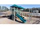 Community playground with climbing wall, slide, and monkey bars providing a fun space at 319 Elgin Dr # 156, Lawrenceville, GA 30045