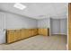 Basement features plenty of cabinet and counter space, and access to the utility room at 5302 Greenway Dr, Villa Rica, GA 30180