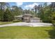Spacious brick home with three-car garage on a large lot provides an inviting appeal at 5302 Greenway Dr, Villa Rica, GA 30180