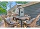 Back deck with outdoor dining set near the back door at 183 Oak Dr, Atlanta, GA 30354