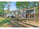 Backyard featuring a deck with outdoor seating and wooded views at 183 Oak Dr, Atlanta, GA 30354