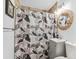 Bathroom featuring decorative shower curtain, modern vanity, and coordinated finishes at 183 Oak Dr, Atlanta, GA 30354