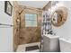 Bathroom featuring decorative shower curtain, modern vanity, and coordinated finishes at 183 Oak Dr, Atlanta, GA 30354