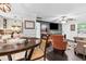 Inviting open-concept living space with modern decor and a seamless flow from dining to living area at 183 Oak Dr, Atlanta, GA 30354