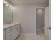 Well-appointed bathroom featuring white cabinets, stylish fixtures, and ample counter space at 1976 Deco Dr, Kennesaw, GA 30144