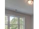 Bright bedroom with large windows offering serene views and natural light at 1976 Deco Dr, Kennesaw, GA 30144