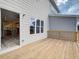 The back deck leads into the house with big sliding doors and a view to the kitchen at 1976 Deco Dr, Kennesaw, GA 30144