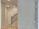 Bright foyer with hardwood floors and staircase leading to the upper level at 1976 Deco Dr, Kennesaw, GA 30144