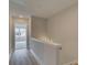 Bright hallway features wood floors, neutral walls, and leads to a well-lit room at 1976 Deco Dr, Kennesaw, GA 30144