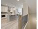 Contemporary kitchen featuring white cabinets, a large island, and stainless steel appliances at 1976 Deco Dr, Kennesaw, GA 30144