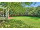 A level backyard and covered sunroom enhance this home's appeal at 2205 Desmond Dr, Decatur, GA 30033