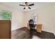 This cozy bedroom has hardwood floors and plenty of natural light at 2205 Desmond Dr, Decatur, GA 30033