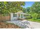 Charming home with a well-manicured lawn and a paved driveway at 2205 Desmond Dr, Decatur, GA 30033