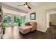 Sunroom with hardwood floors, large windows, and comfortable seating, perfect for relaxation at 2205 Desmond Dr, Decatur, GA 30033