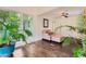 Cozy sunroom with hardwood floors, ample light, comfortable seating, and large windows at 2205 Desmond Dr, Decatur, GA 30033