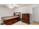 Bedroom featuring wooden dressers and a bed with built-in drawer storage at 2100 Ann Se Ct, Conyers, GA 30013