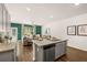 Modern kitchen with stainless steel appliances, granite countertops, and a spacious island with seating at 329 Elgin Dr # 157, Lawrenceville, GA 30045