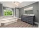 Bright bathroom with a soaking tub and modern vanity, offering a relaxing retreat at 387 Nickajack Se Rd, Mableton, GA 30126