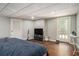 Comfortable bedroom with wood floors, modern decor, and easy access to the outside at 387 Nickajack Se Rd, Mableton, GA 30126