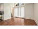 Bright bedroom with hardwood floors, a large window, and a peaceful ambiance at 387 Nickajack Se Rd, Mableton, GA 30126