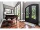 Elegant entryway with grand double doors and hardwood floors at 387 Nickajack Se Rd, Mableton, GA 30126
