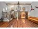 Spacious living room with hardwood floors and stone accents at 387 Nickajack Se Rd, Mableton, GA 30126