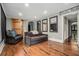 Bright living room with hardwood floors, gray walls and access to main entrance at 387 Nickajack Se Rd, Mableton, GA 30126