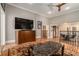 Inviting living area overlooking the dining room with hardwood floors and modern decor at 387 Nickajack Se Rd, Mableton, GA 30126