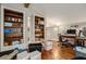 Cozy home office featuring built-in bookshelves and hardwood floors, great for work and study at 387 Nickajack Se Rd, Mableton, GA 30126