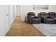 Finished room with seating area, hardwood flooring and carpet at 410 Crestbrook Ln, Dallas, GA 30157