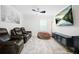 Recreation room with a ceiling fan, entertainment center, seating and television at 410 Crestbrook Ln, Dallas, GA 30157