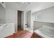 Large Primary bathroom featuring a double sink vanity and walk-in shower at 7117 Stonebrook Cv, Lithonia, GA 30058