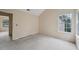 Carpeted bedroom with natural light streaming through the window at 7117 Stonebrook Cv, Lithonia, GA 30058