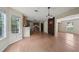 Open-concept kitchen and dining area with stainless steel appliances and a breakfast bar at 7117 Stonebrook Cv, Lithonia, GA 30058